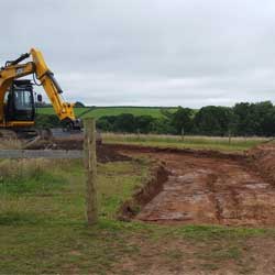 Digging new driveway.